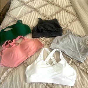 Lot of Lululemon sports bras. One Running girl bra.